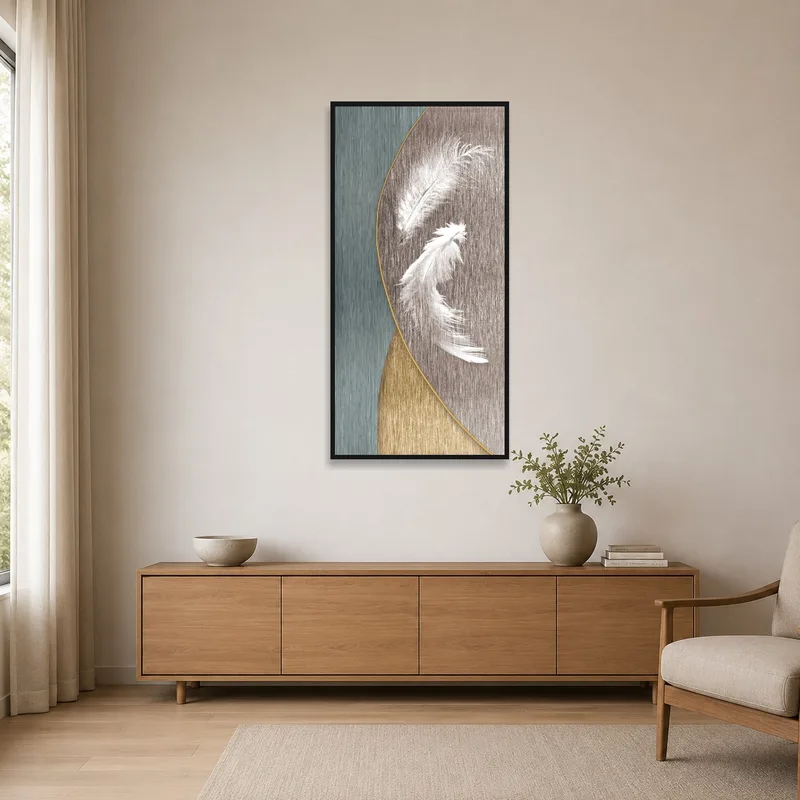 Feather artwork on a stark white minimalist wall.