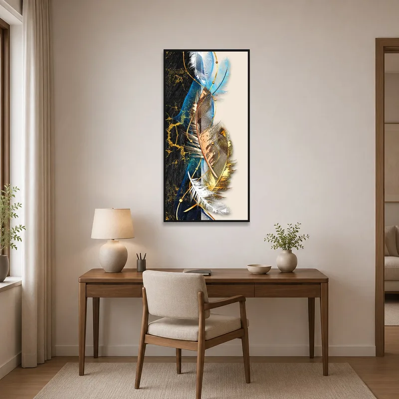 Feather and gold accented art bringing sophistication to a home office space.
