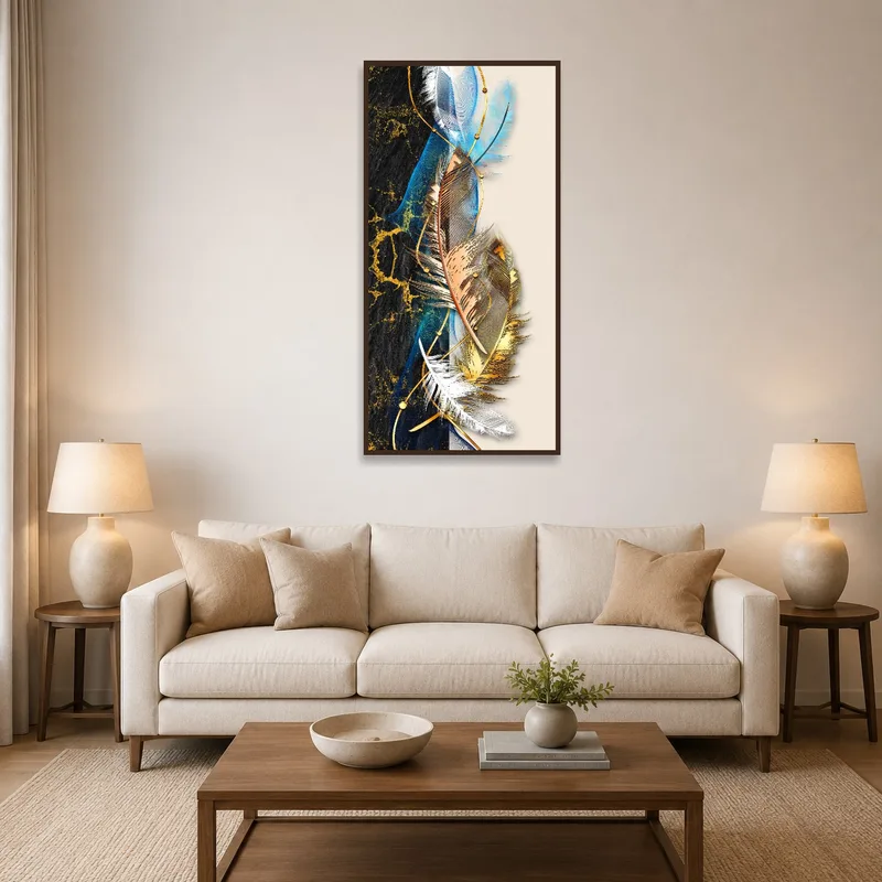 Wall art with feathers and gold accents adding elegance to a living room setting.