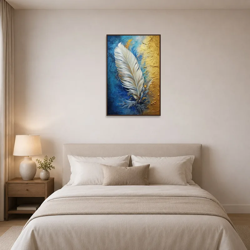 Feather art in blue and gold textures complements the tranquil bedroom decor.
