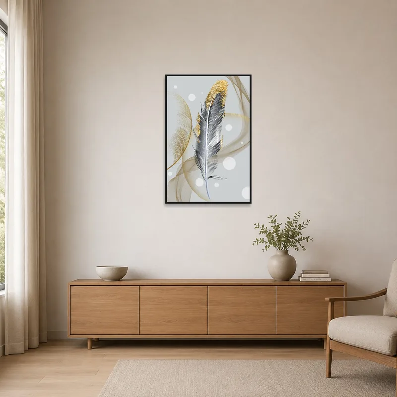 A minimalist space displaying a feather art piece with abstract golden tones.