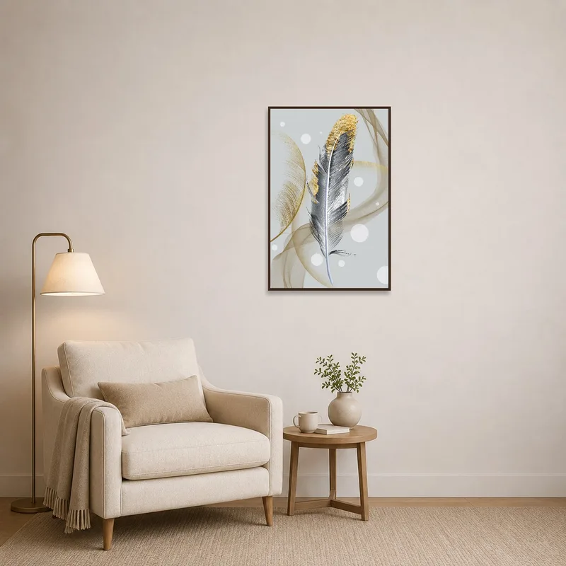 A reading corner highlighted by an elegant feather art with golden accents.