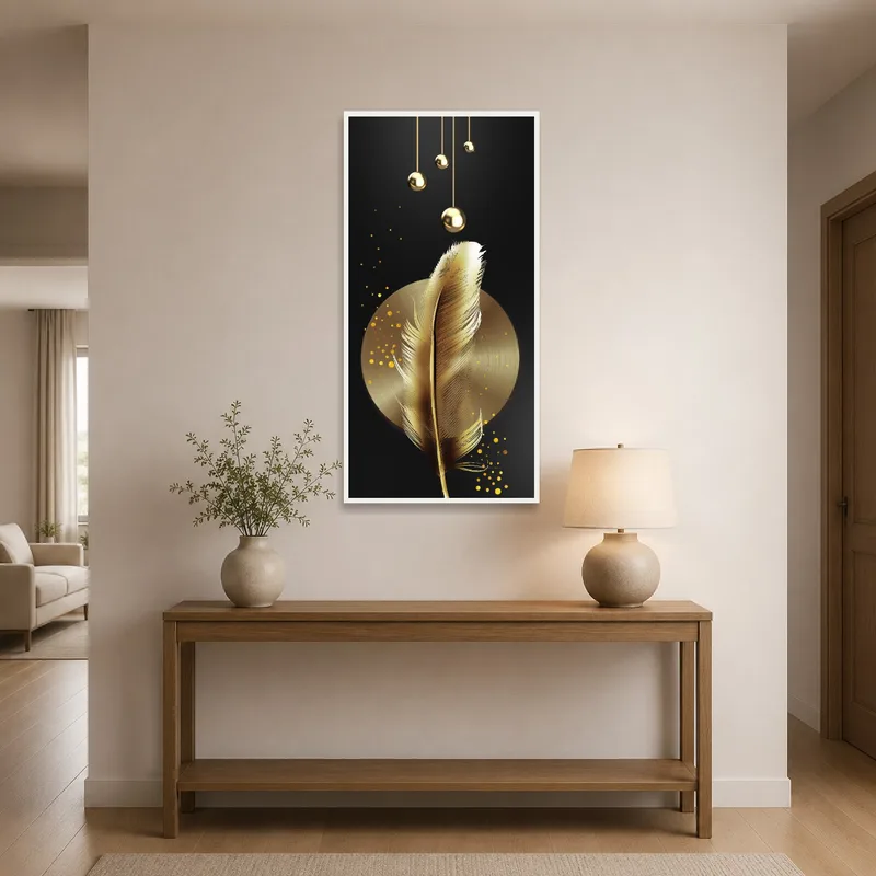 Feather art print with gold accents in an entrance hall above a slim console table.