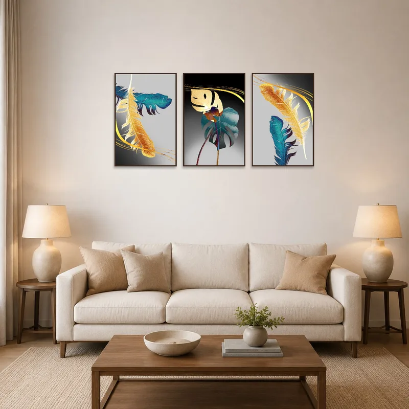 The triptych of feathers and leaves adorns a living room wall, enhancing the elegant decor.