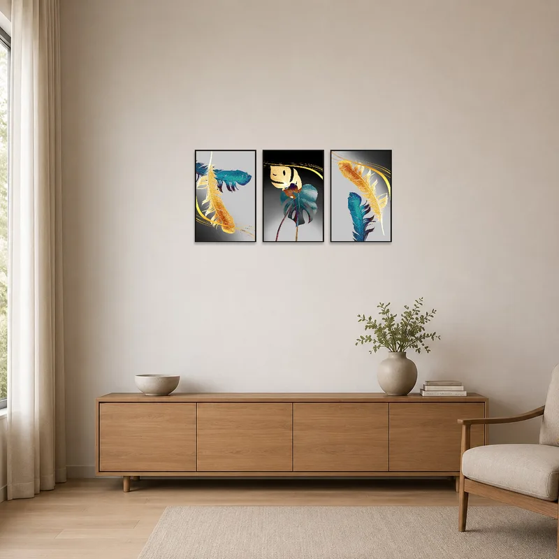 In a minimalist setting, the feather and leaves triptych adds a subtle touch of nature.