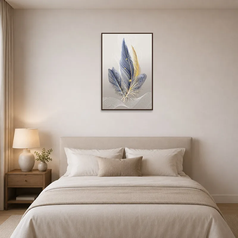 Elegant feather art print infusing sophistication into a serene bedroom.