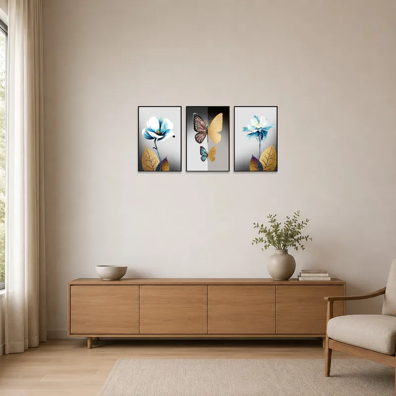Simple floral and butterfly triptych against a minimalist wall.