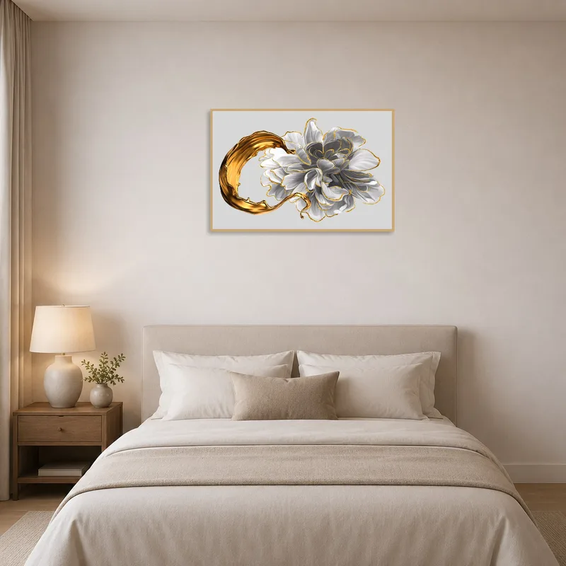 Floral and gold abstract print adding warmth to a bedroom setting.