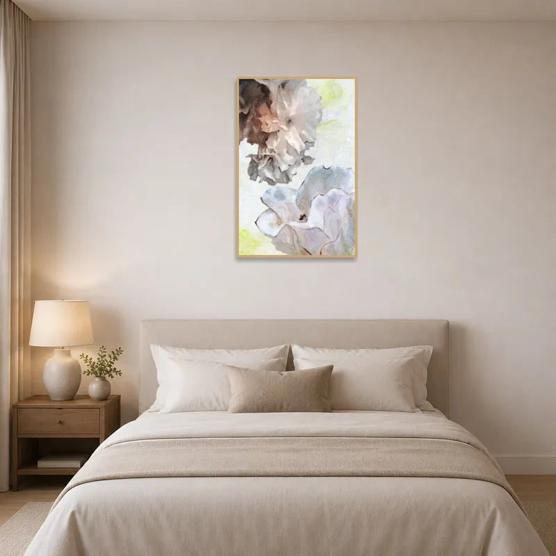 Elegant soft pastel floral artwork enhances the serene atmosphere of a comfy bedroom.