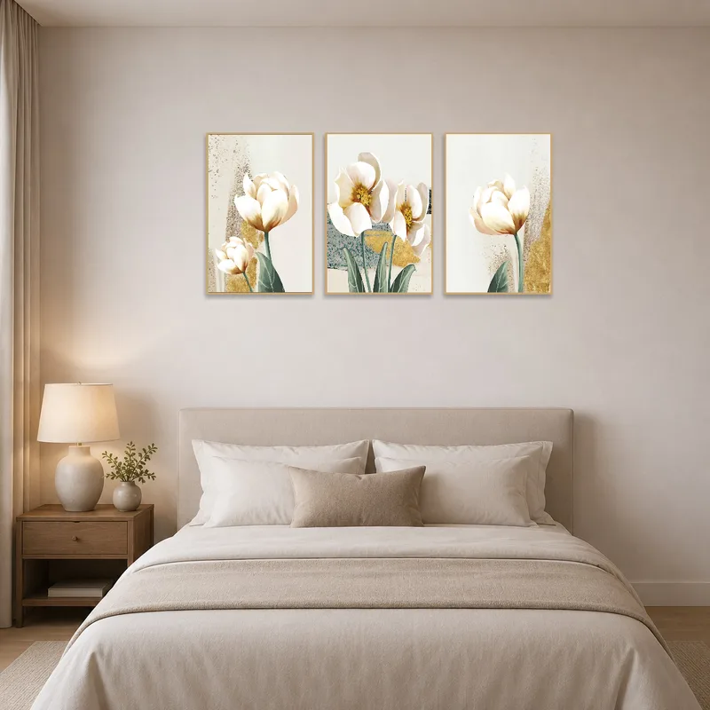 Bedroom wall showcasing an elegant floral triptych with gold and ivory hues, offering a calming ambience.