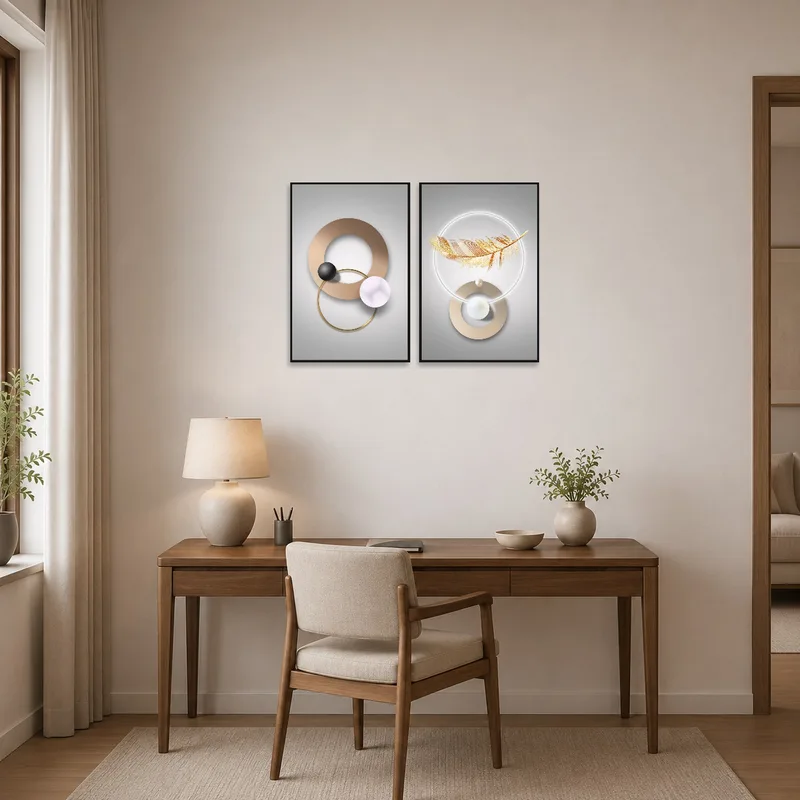 Sophisticated home office with geometric and feather art set hung above the desk.