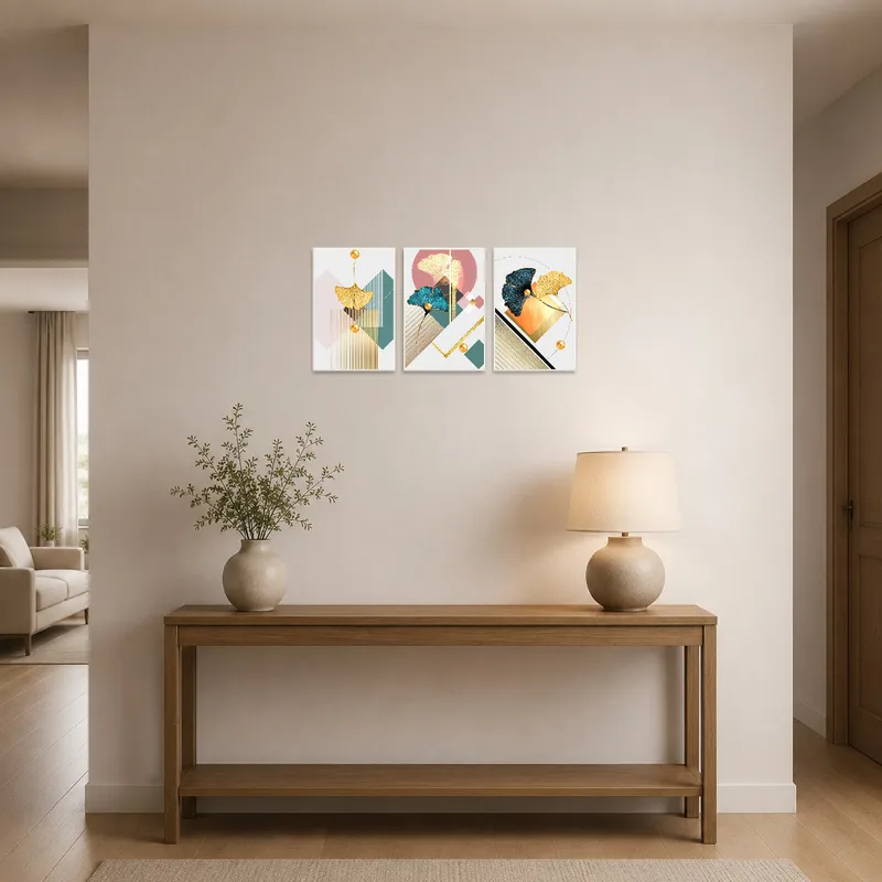 Ginkgo triptych art enhancing the entrance hall with geometric style.