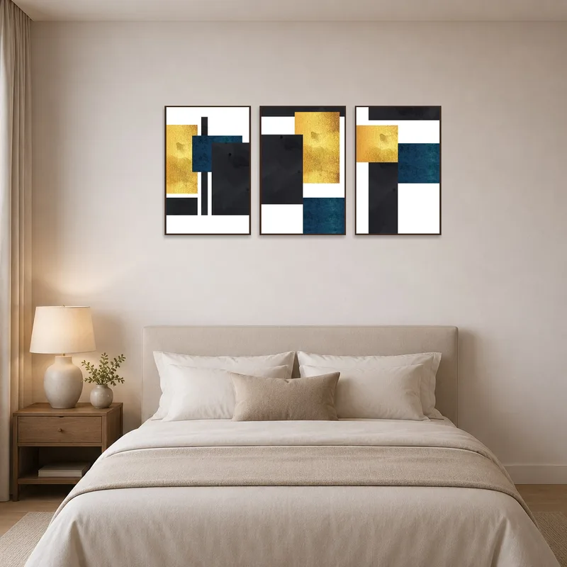 Bedroom decorated with a serene gold and blue geometric triptych set.