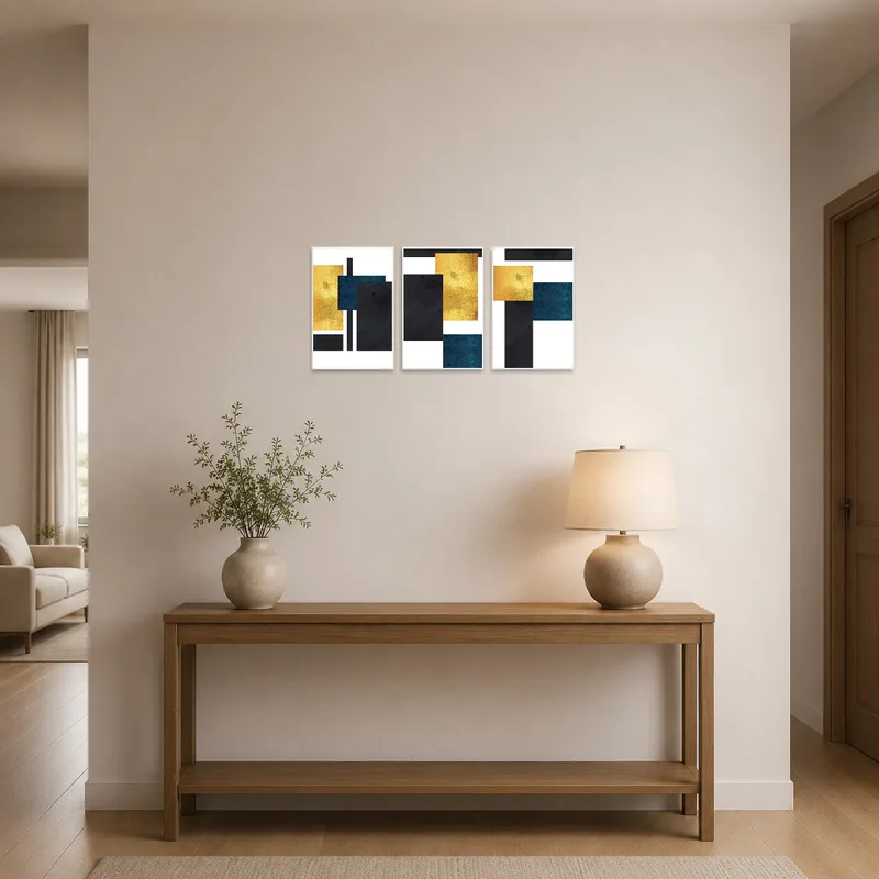 Entrance hall with geometric gold and blue art triptych on the wall.
