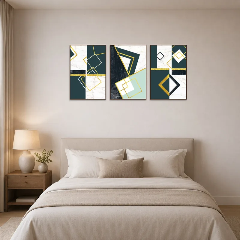 Geometric marble and gold art providing elegance in a tranquil bedroom.