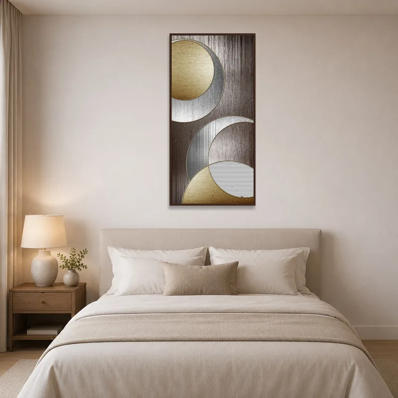 Elegant geometric metallic circles art print displayed in a serene bedroom.