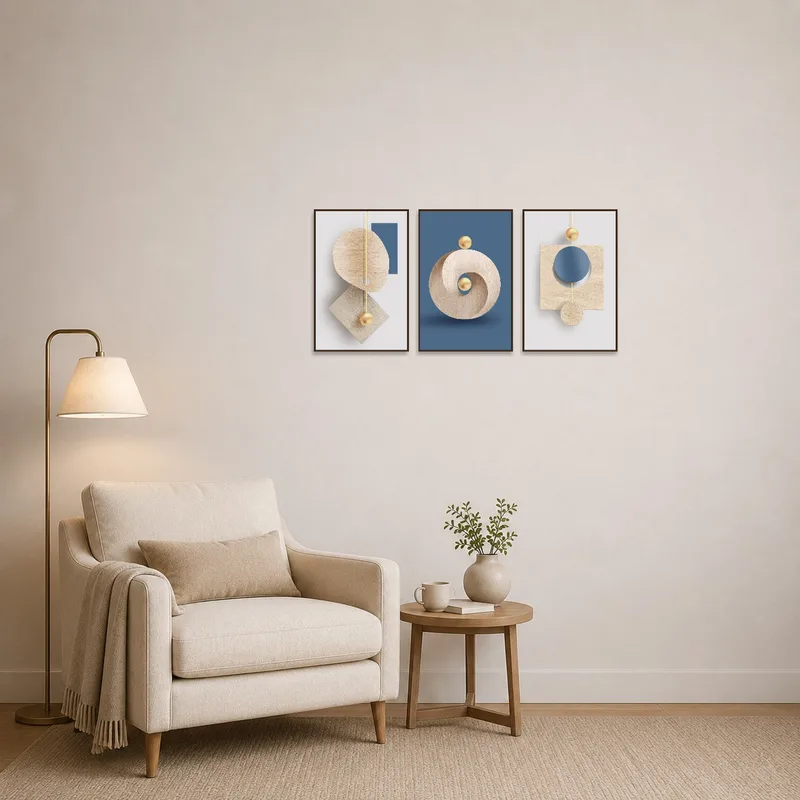 The reading corner features a calming geometric triptych above a cozy armchair.