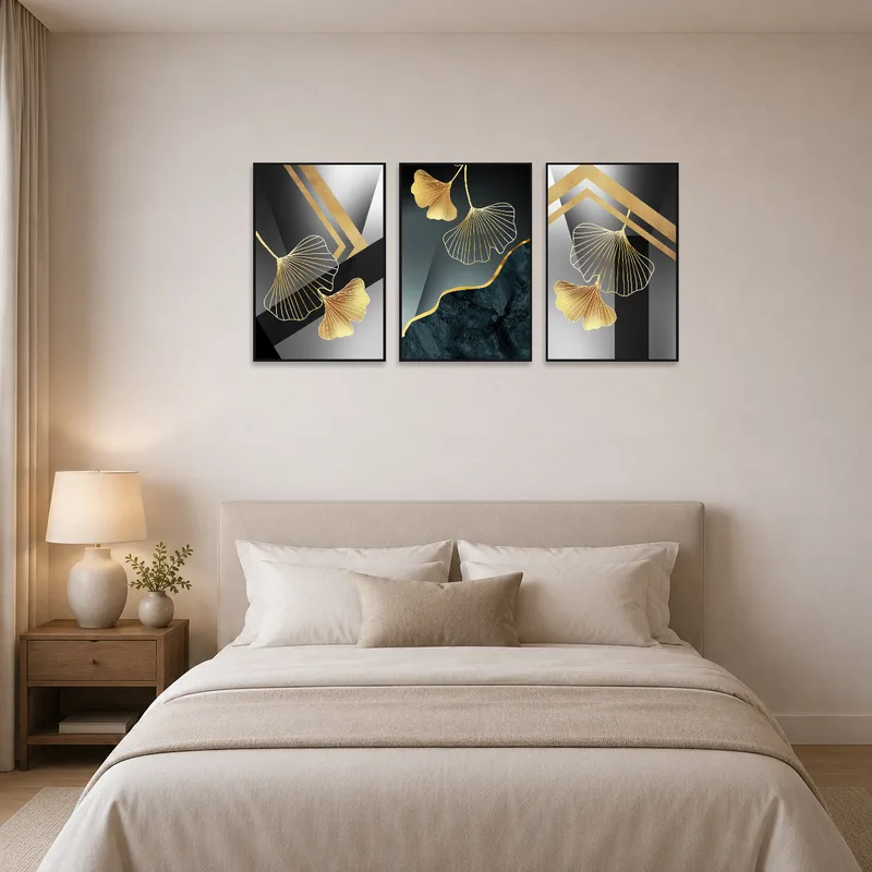Elegant Ginkgo Leaf abstract triptych set adds tranquility to a serene bedroom setting.