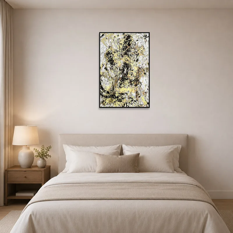 Chic gold and black abstract art print adding elegance above the bed.