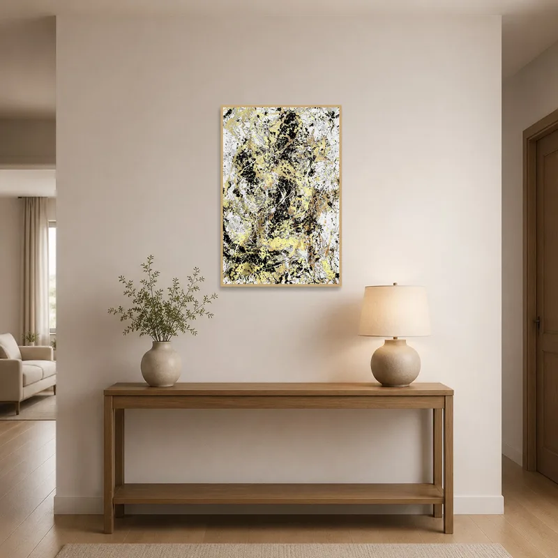 Sophisticated gold and black abstract print greeting guests in an elegant entrance hall.