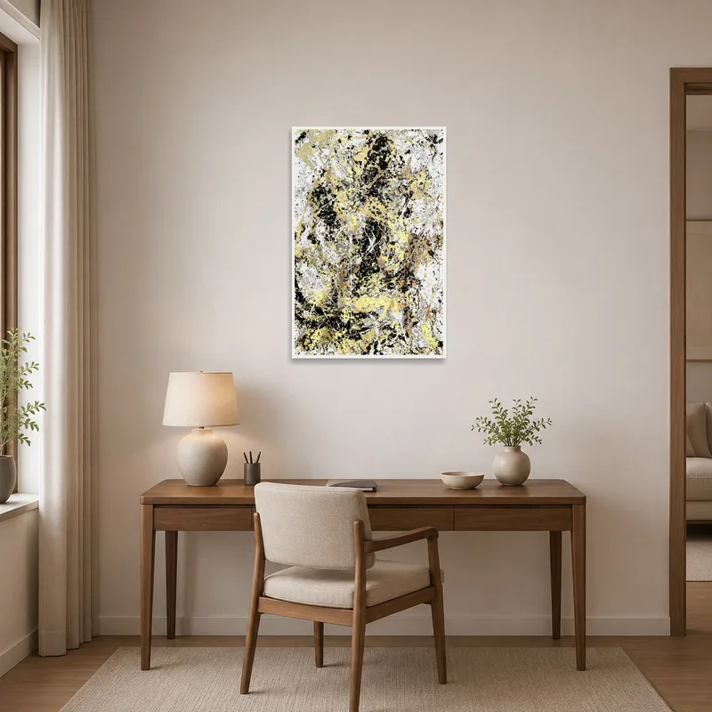 Gold and black abstract art inspiring creativity in a well-organized home office.
