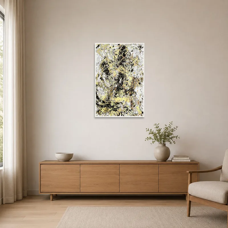 Gold and black abstract art print in a minimalist room with clean lines and neutral tones.