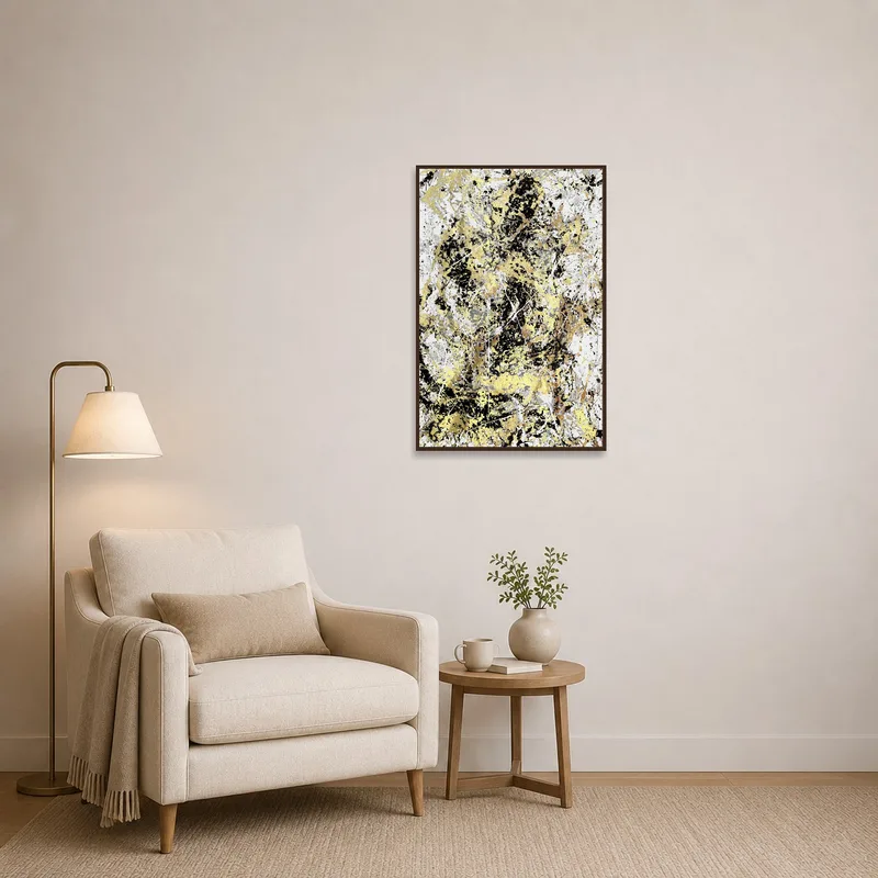 Stylish gold and black abstract artwork enhancing a cozy reading corner.