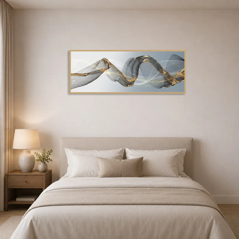 Bedroom features serene abstract wave artwork in gold and grey.