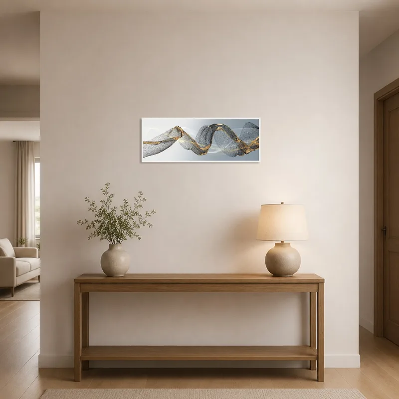 Entrance hall adorned with a gold and grey abstract wave artwork.