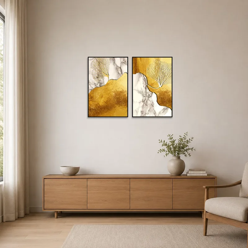 Gold and marble artwork set enhancing a minimalist space.