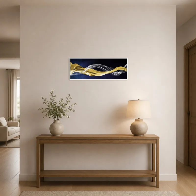 Elegant gold and silver abstract waves art in an entrance hall enhancing a welcoming vibe with subtle lighting.