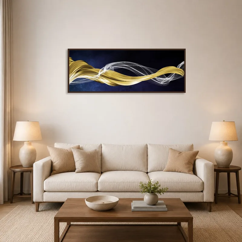 Elegant gold and silver abstract waves art in a cozy living room setting with neutral-colored furniture.