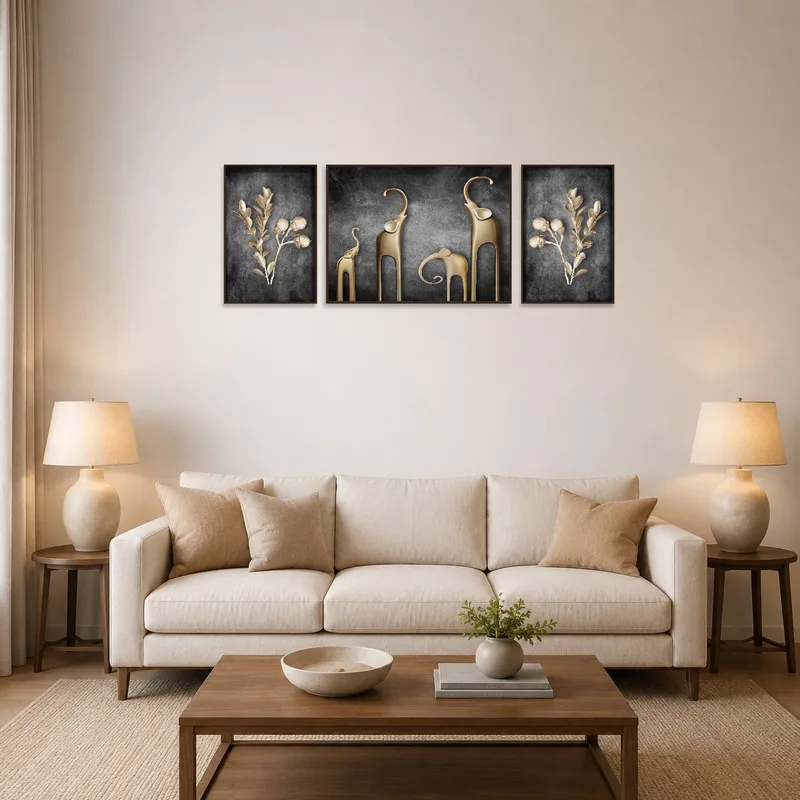 Elegant gold botanical and elephant triptych above a cozy couch in the living-room.