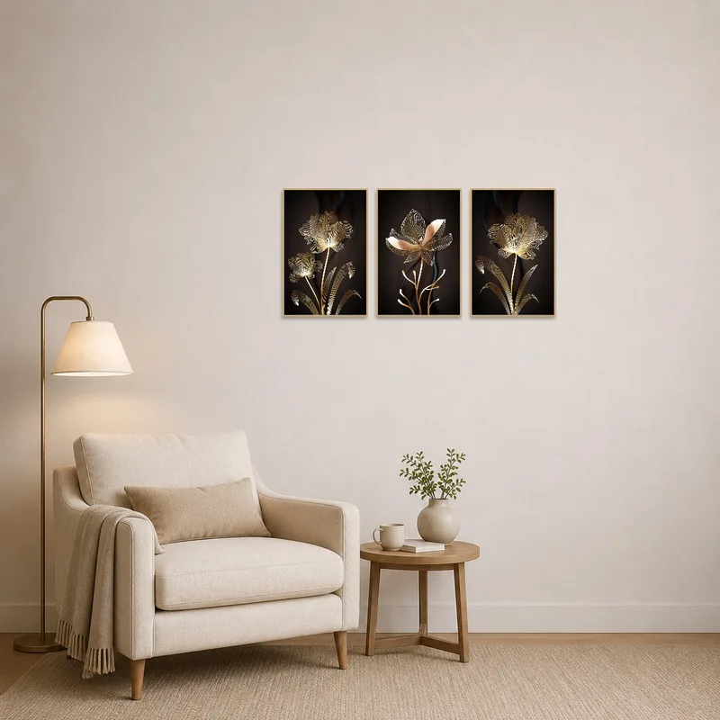Gold botanical art adds a touch of elegance to reading corner with an armchair and bookshelf.