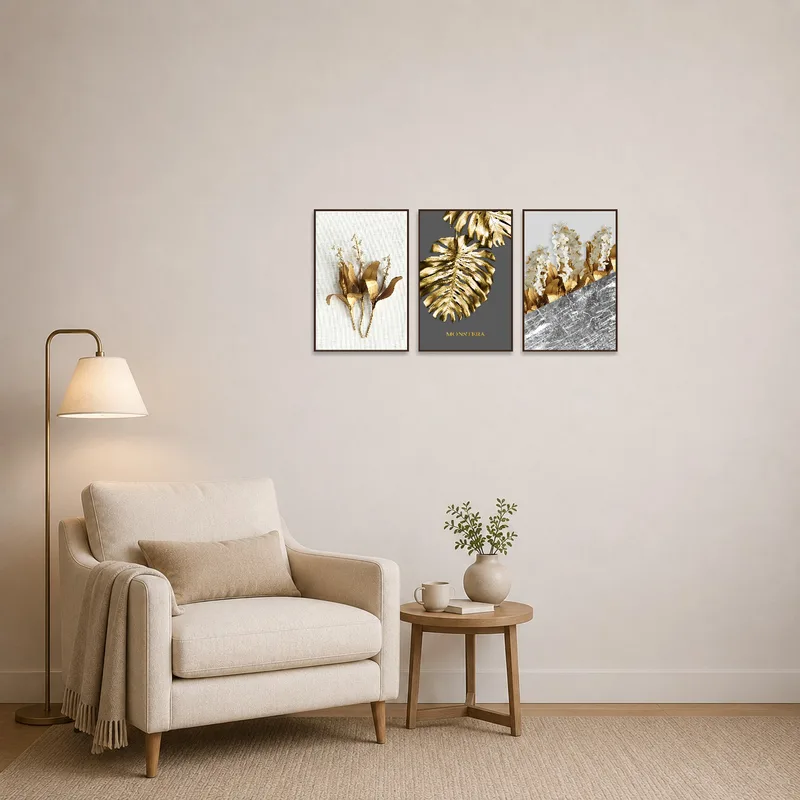 Gold botanical artwork set adding sophistication to a cozy reading corner.