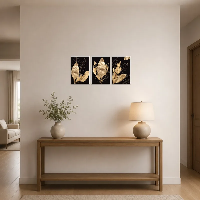 Elegant Gold Leaf Triptych on Black making a statement in an entrance hall.