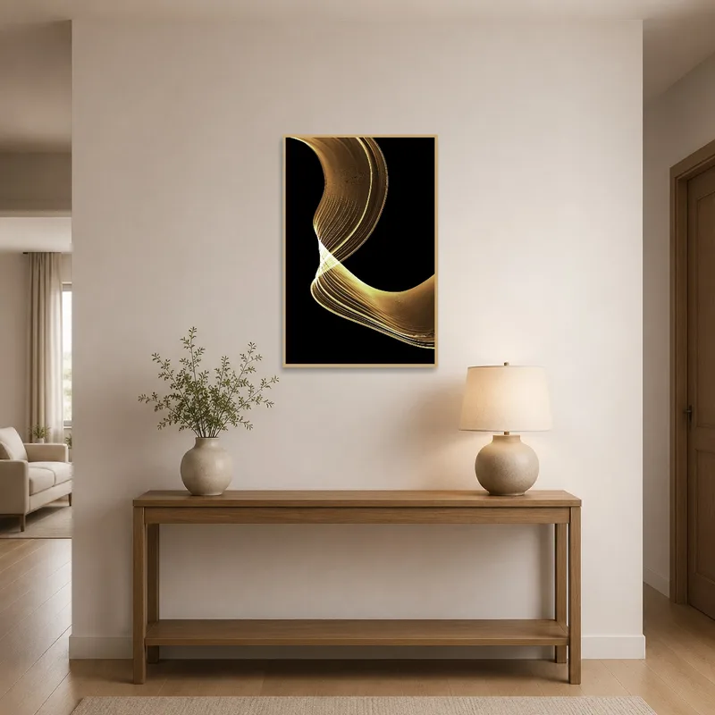 Elegant gold wave abstract art on black welcoming guests in an entrance hall.
