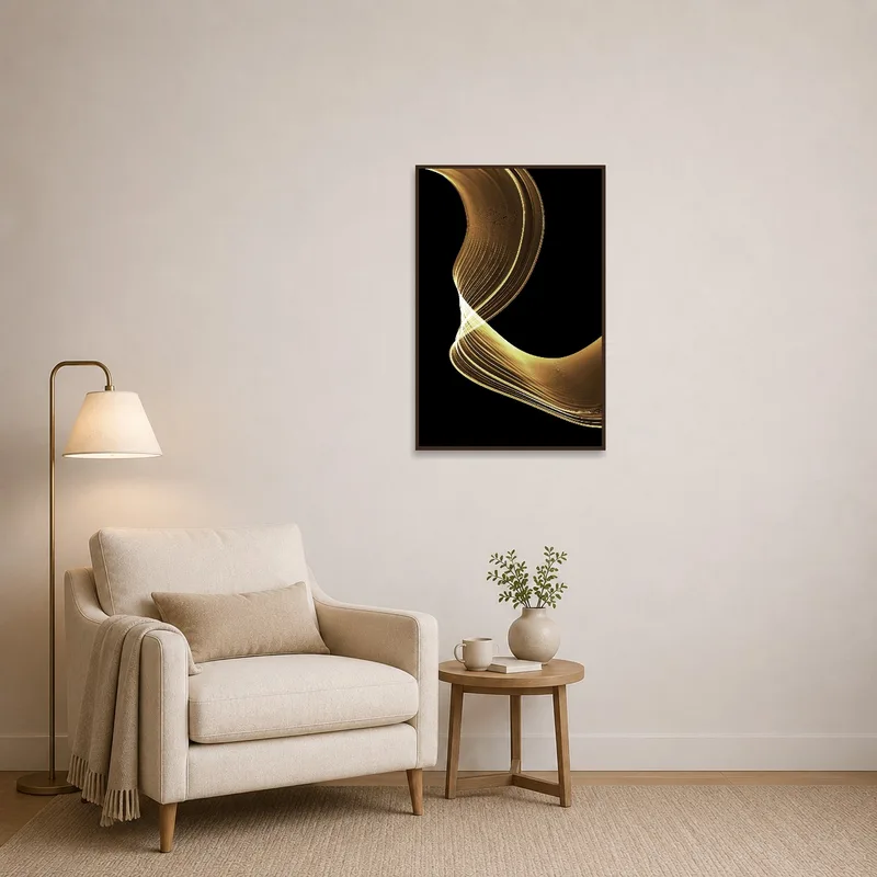 Elegant gold wave abstract art on black adding ambiance to a reading corner.