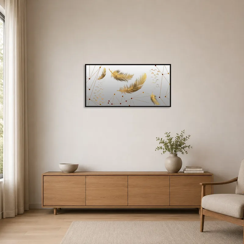 Artwork with golden feathers and birds adds a touch of elegance to a minimalist space.