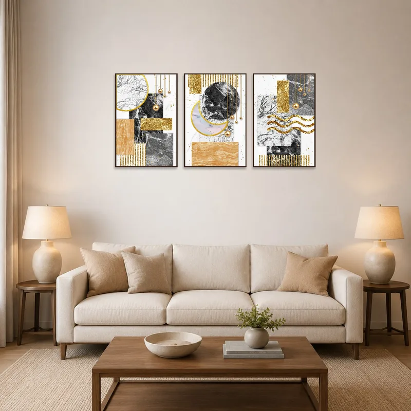 Abstract triptych art above a sofa in a living-room setting.