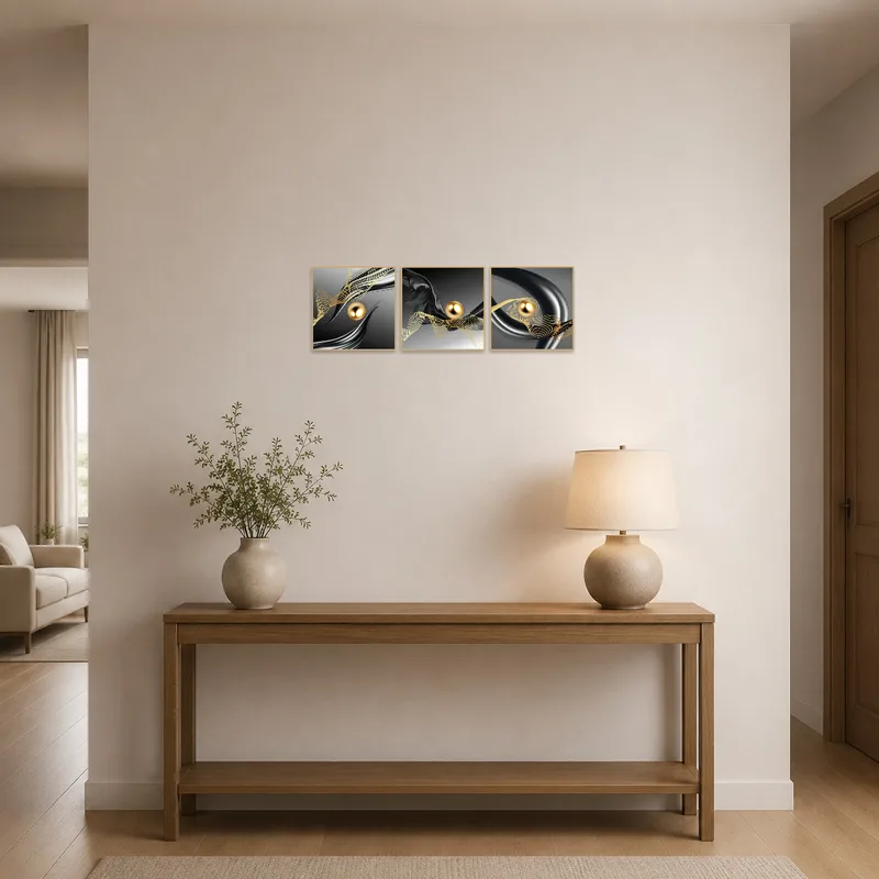 Abstract metallic and golden triptych greets in the entrance hall.