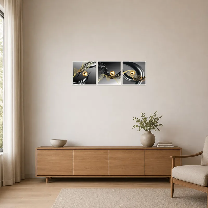 Golden abstract triptych in a minimalist space.