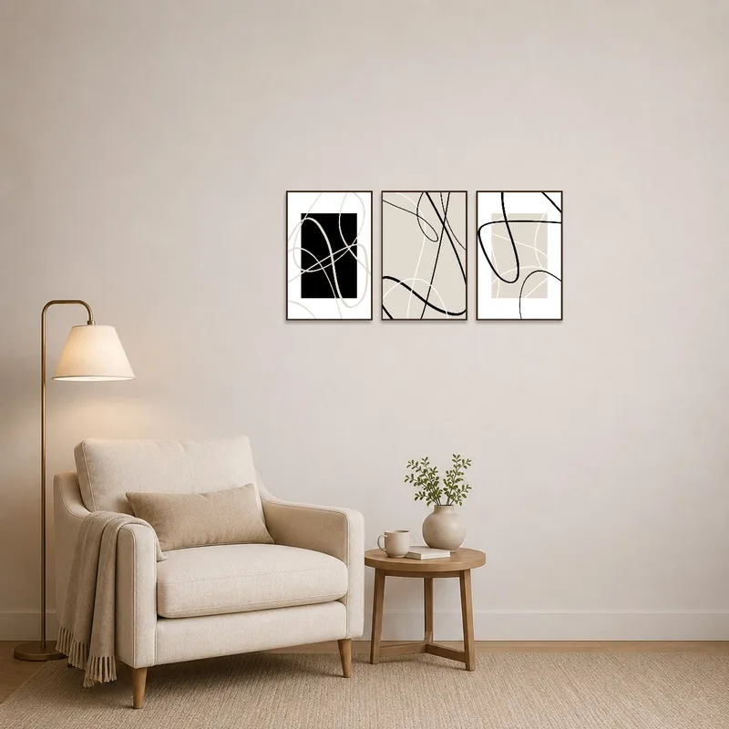 Elegant minimalist abstract line art triptych in a cozy reading corner with a comfy chair.