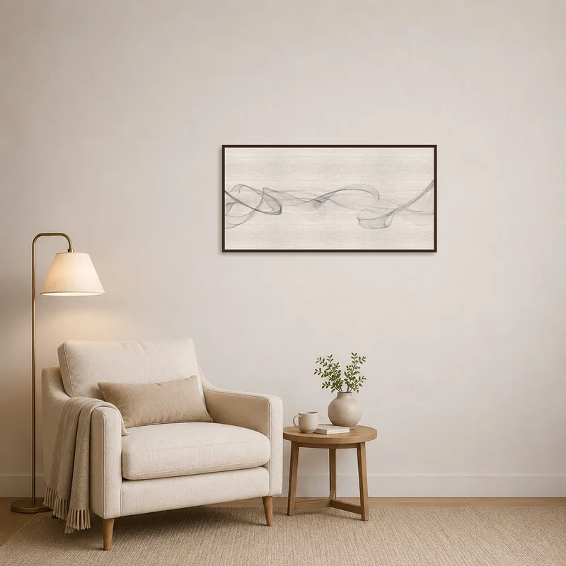 Monochrome wave art creating a serene vibe in reading corner.