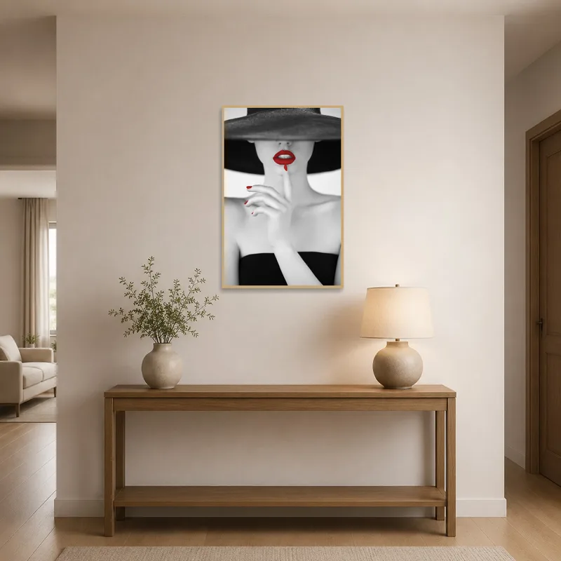 Entrance hall featuring a bold monochrome portrait with red highlights.