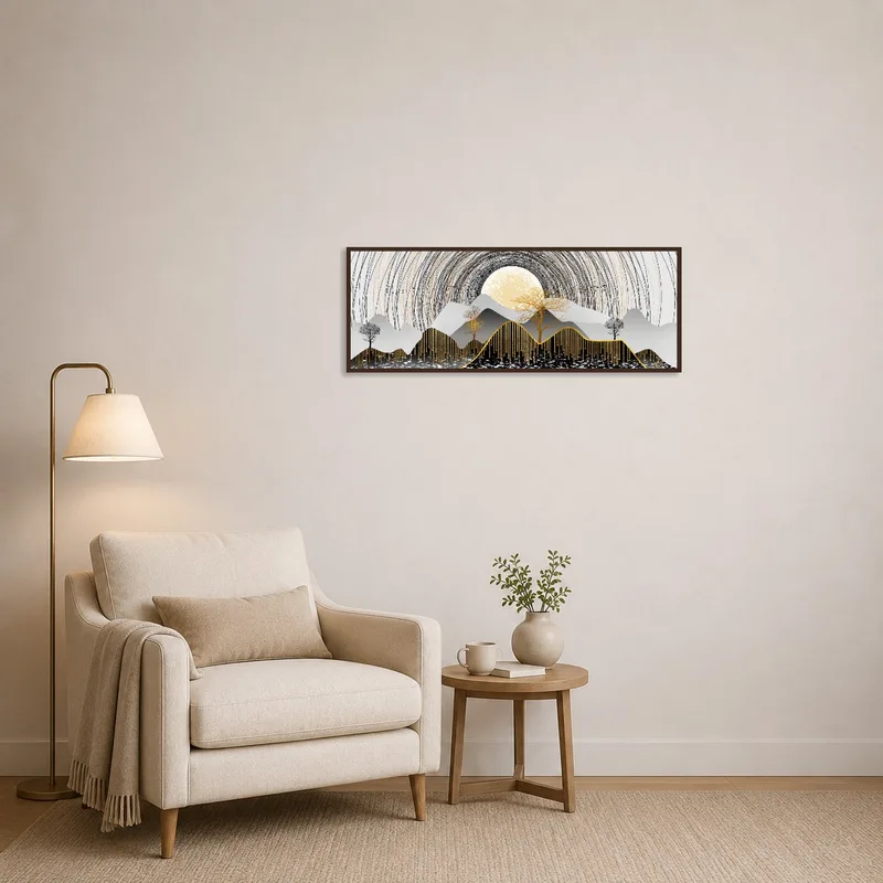 Serene mountain art above a chair in a reading corner.
