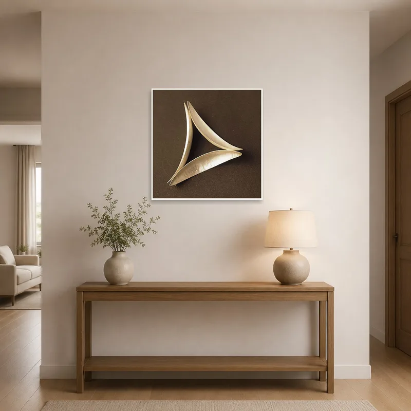 Entrance hall exhibiting a geometric seed pod art print, welcoming guests with elegance.