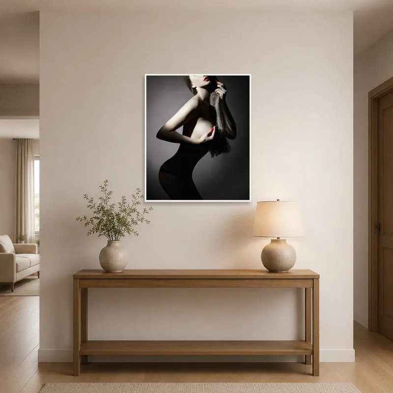 Entrance hall adorned with a striking nude silhouette art piece emphasized by shadows.