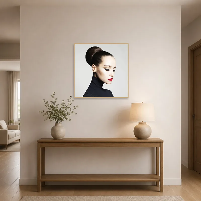 Portrait with red lips displayed in a stylish entrance-hall.