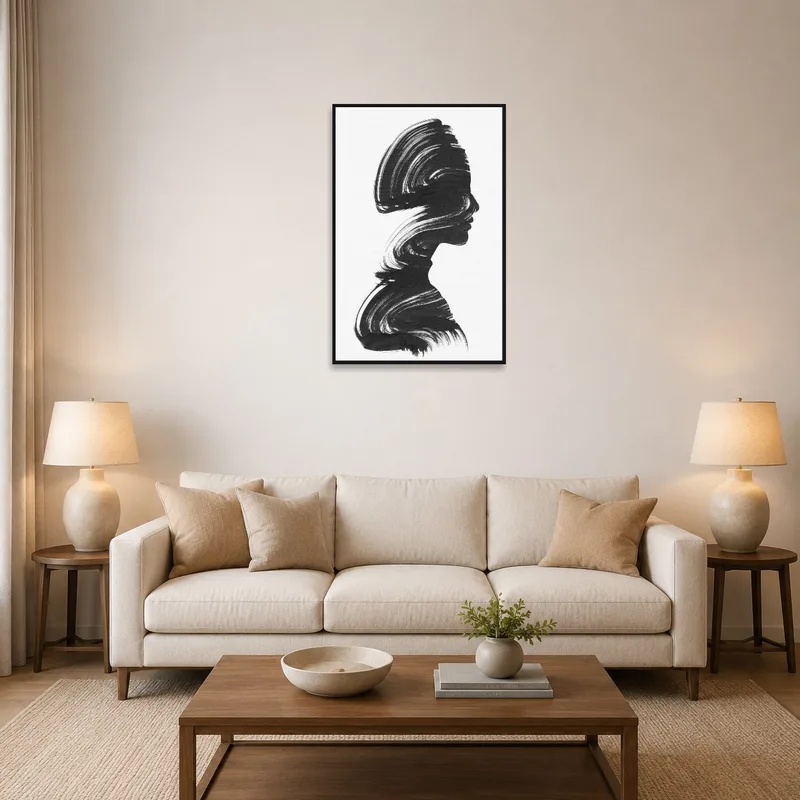 Elegant silhouette brushstroke art print in a stylish living room setting.